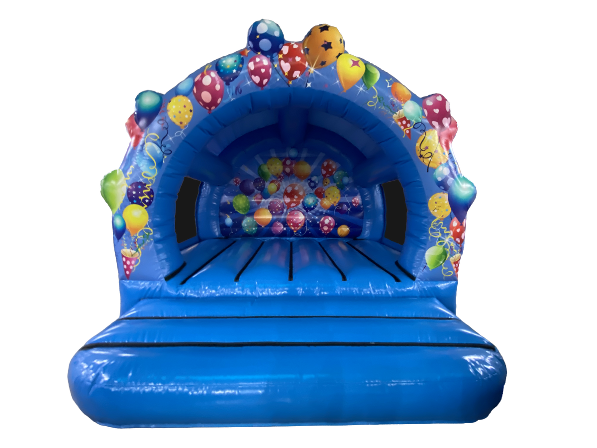 A blue inflatable bounce house with a ball pit and colorful balloon decorations, isolated on a white background.
