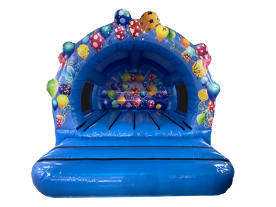 A blue inflatable bounce house with a ball pit and colorful balloon decorations, isolated on a white background.