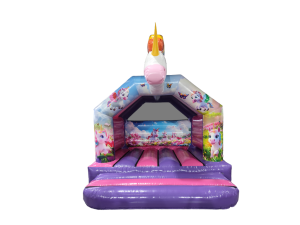 A children's inflatable bounce house with a unicorn design, featuring a purple base, pink steps, and a white unicorn head with a gold horn on the front.
