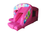 Boîte de saut et toboggan de fête rose