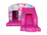 Boîte de saut et toboggan de fête rose