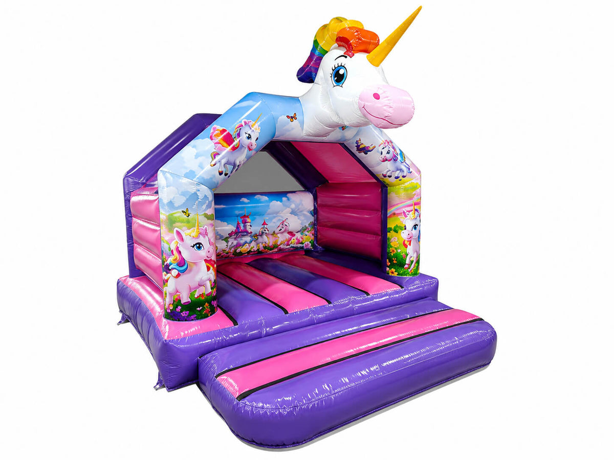 Airquee 3D unicorn A-frame bouncy castle in pink and purple with rainbow and fantasy landscape artwork