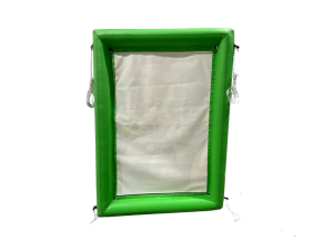 Airquee Catch It Game with a green inflatable frame and Easter-themed backdrop for interactive reaction play.