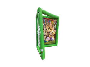 Airquee Catch It Game with Easter-themed backdrop featuring cute bunnies and eggs in a green inflatable frame.