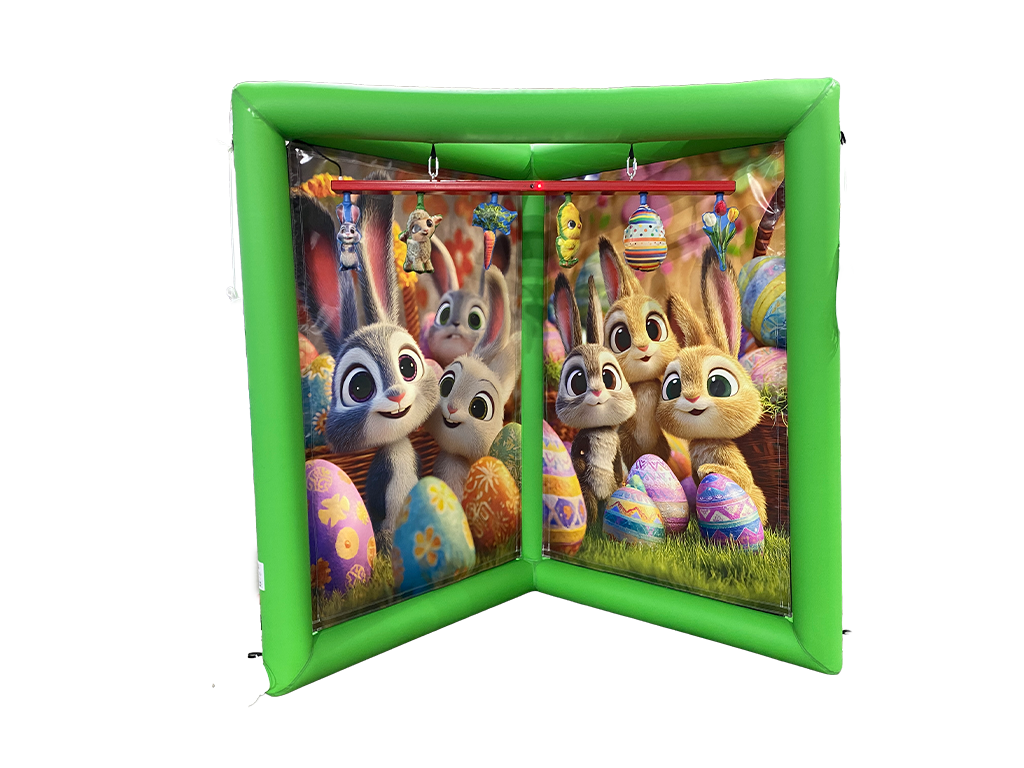 Airquee Catch It Game with Easter-themed backdrop featuring cute bunnies and colourful eggs for reaction challenges.