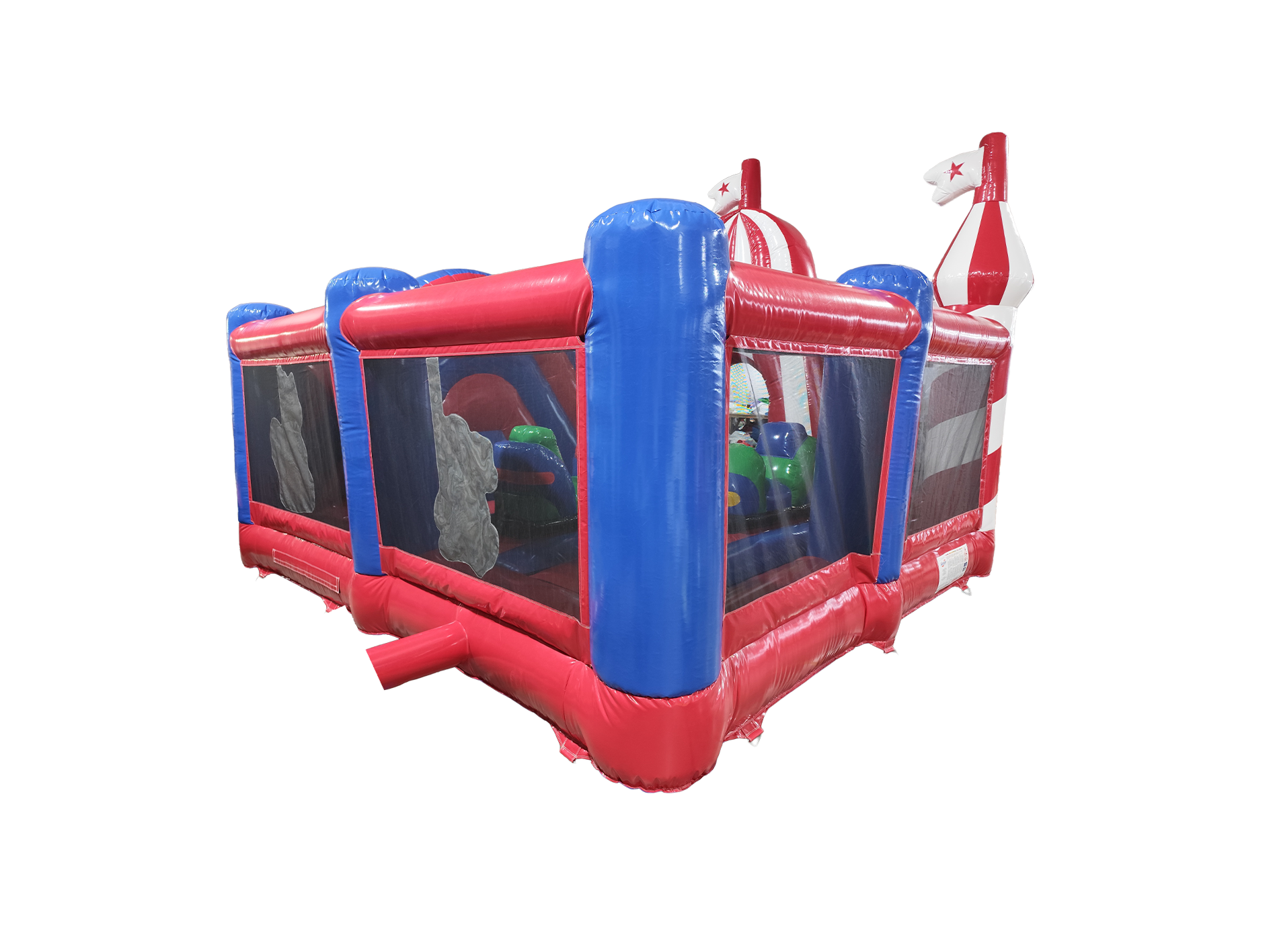 Airquee Fun Fair Multiplay inflatable with red and blue PVC walls, mesh sides, and circus-themed roof accents.