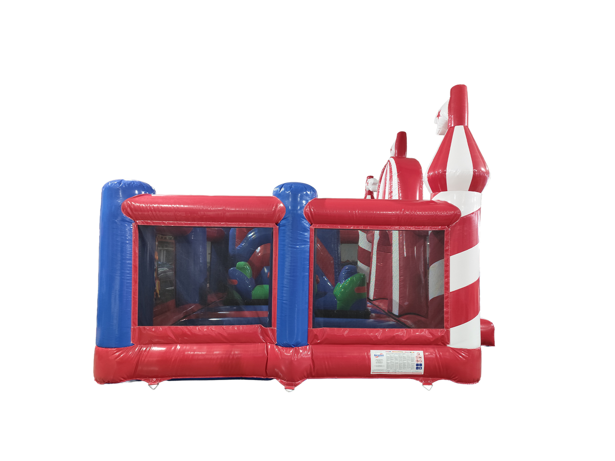 Airquee Fun Fair Multiplay inflatable with red, white, and blue circus-themed design and climbing obstacles.