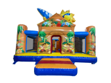 Airquee Hawaiian themed multiplay inflatable bouncy castle with tropical artwork, palm trees, and integrated slide.