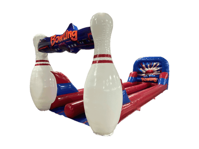 Airquee 3D inflatable bowling alley with giant white pins, red and blue lane, and bowling theme graphics.