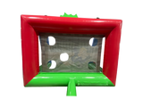Airquee 3D Football Shootout inflatable game with a red and green frame and target holes for shooting practice.