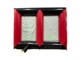 Airquee 2 in 1 inflatable sports game with red and black PVC frame featuring axe throwing and dartboard targets