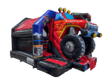 Airquee red and black monster truck themed inflatable bouncy castle with a central front slide and 3D truck design.