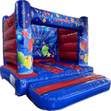 Airquee 4x4m party H-frame bouncy castle in blue and red gloss PVC with colourful balloon and star celebration artwork