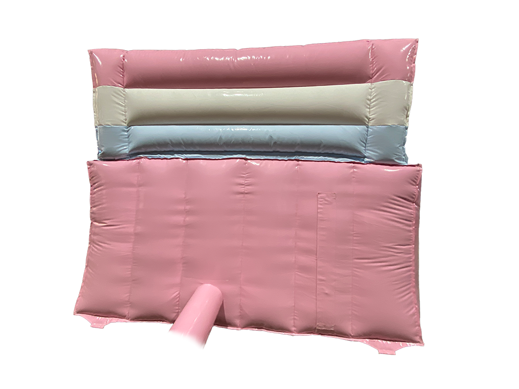 Airquee 1.5m pastel pink, white, and blue inflatable slide made of glossy, easy-to-clean PVC for children's parties.