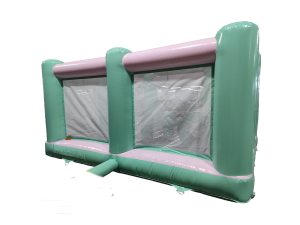 Airquee pastel mint and lilac midi bouncer with mesh panels for high visibility and safe commercial play.